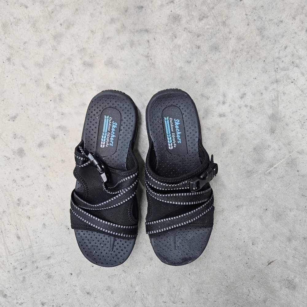 Womens barely used Skechers sandals in size 7